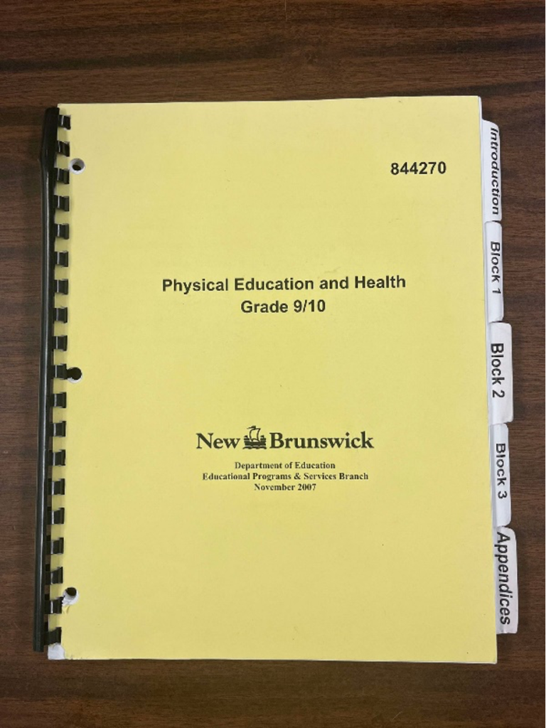 The photo is showing a document that has the title "Physical Education and Health Grade 9/10" on it.