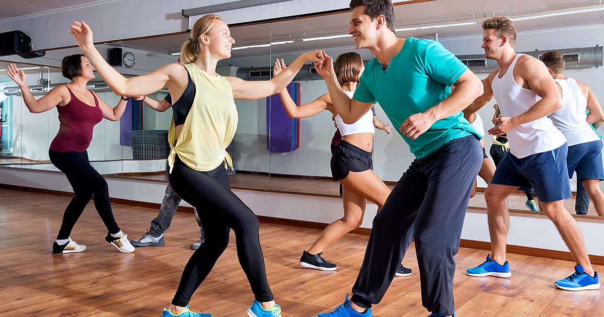adults dancing in a dance studio