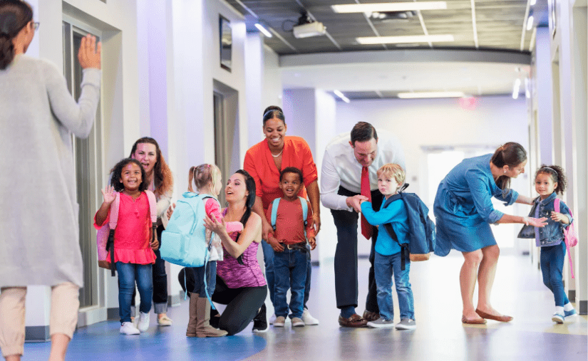 parents and students in a hallway