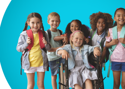 A group of happy kids of various abilities in school attire.